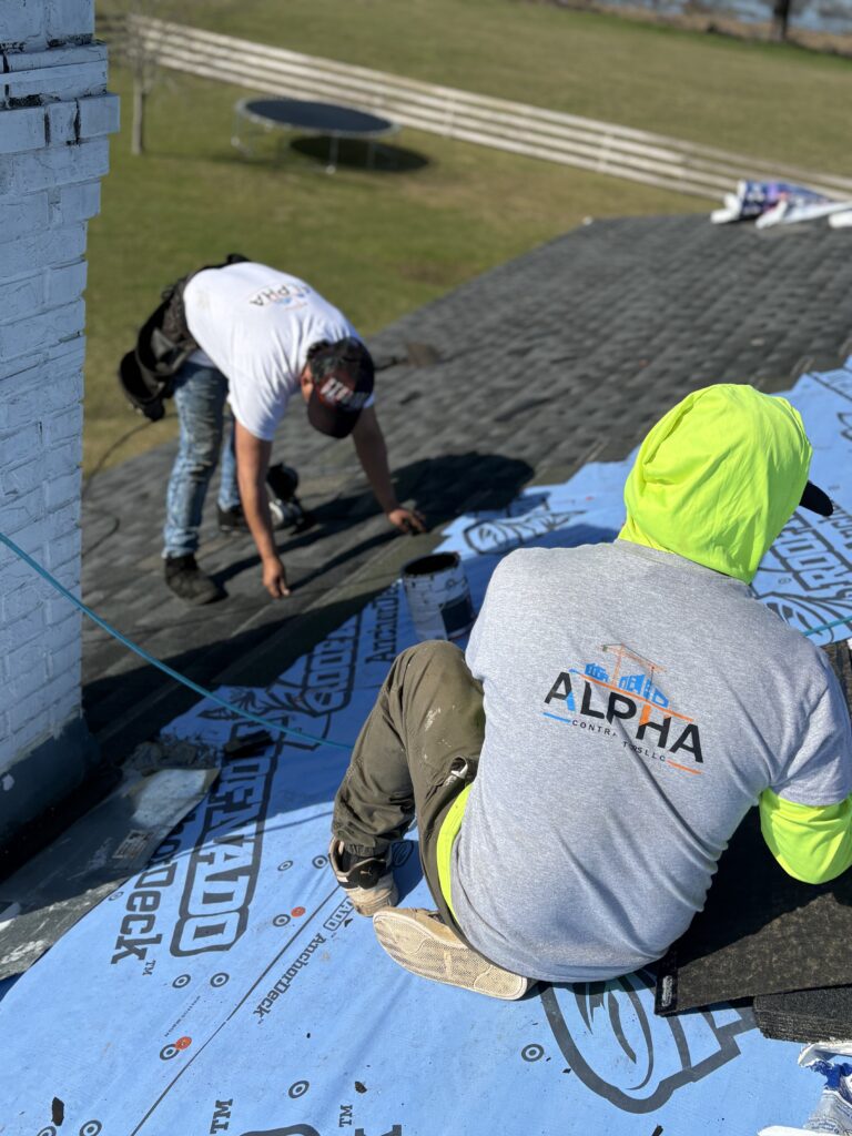 alpha contractors tallahassee guy working on roof