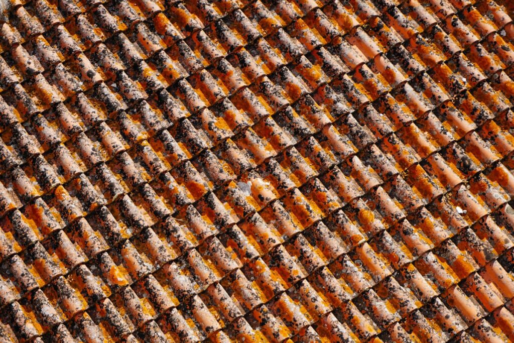 Roofing contractor working on a residential roof